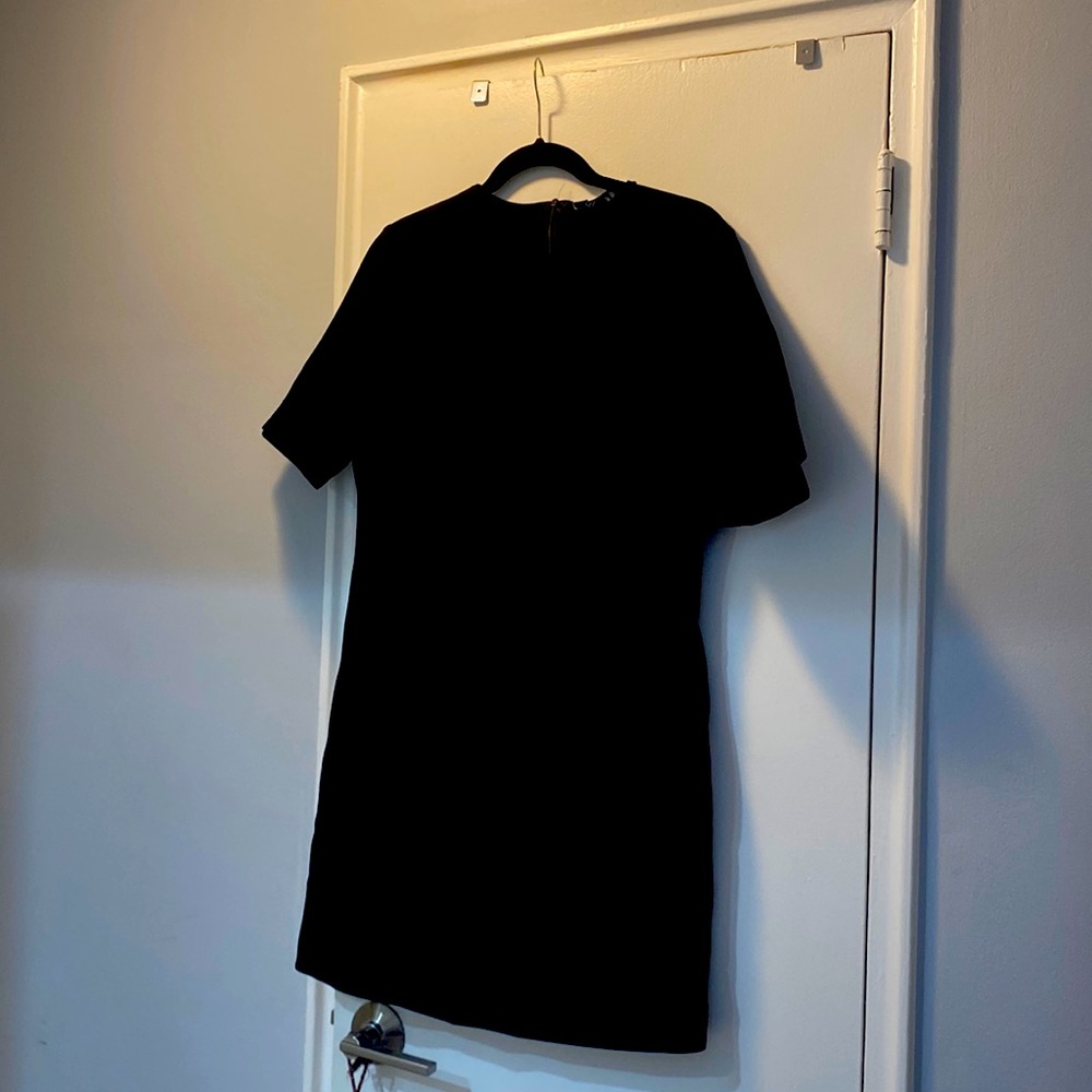 Zara great simple black dress for work. Never worn! Tags still on.